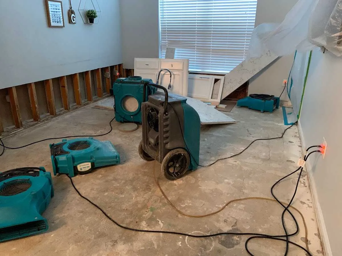 Dehumidifier in flood-cut room for Water Damage Restoration in George Mason
