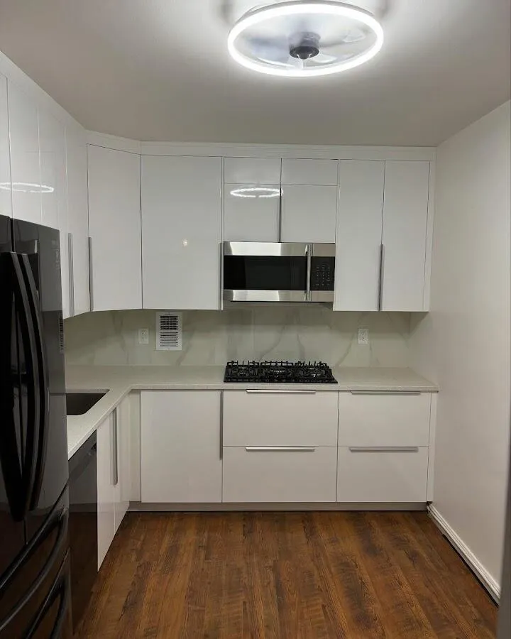 Renovated kitchen with quartz countertops in George Mason